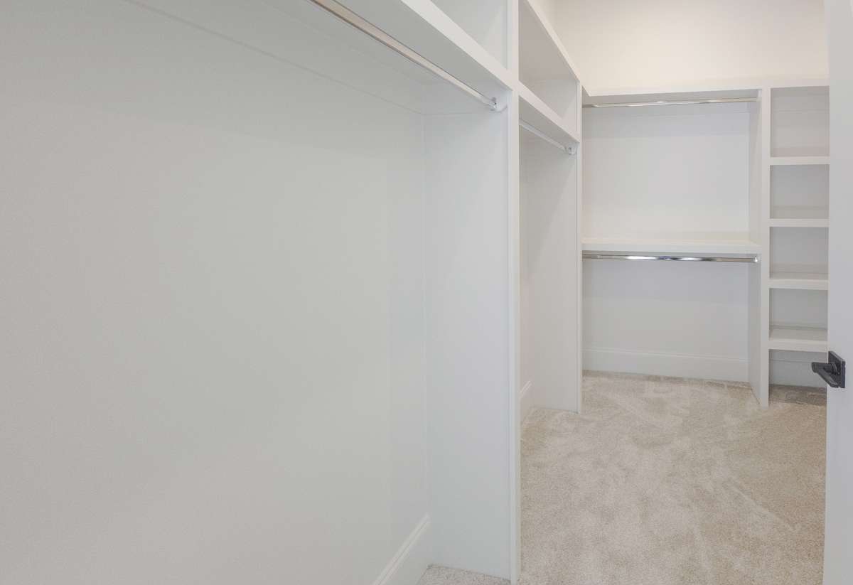 A LARGE walk-in closet in the owner's retreat assures plenty of room for all your needs!