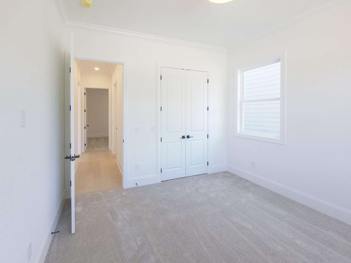 Bedroom 2 offers plenty of natural lighting