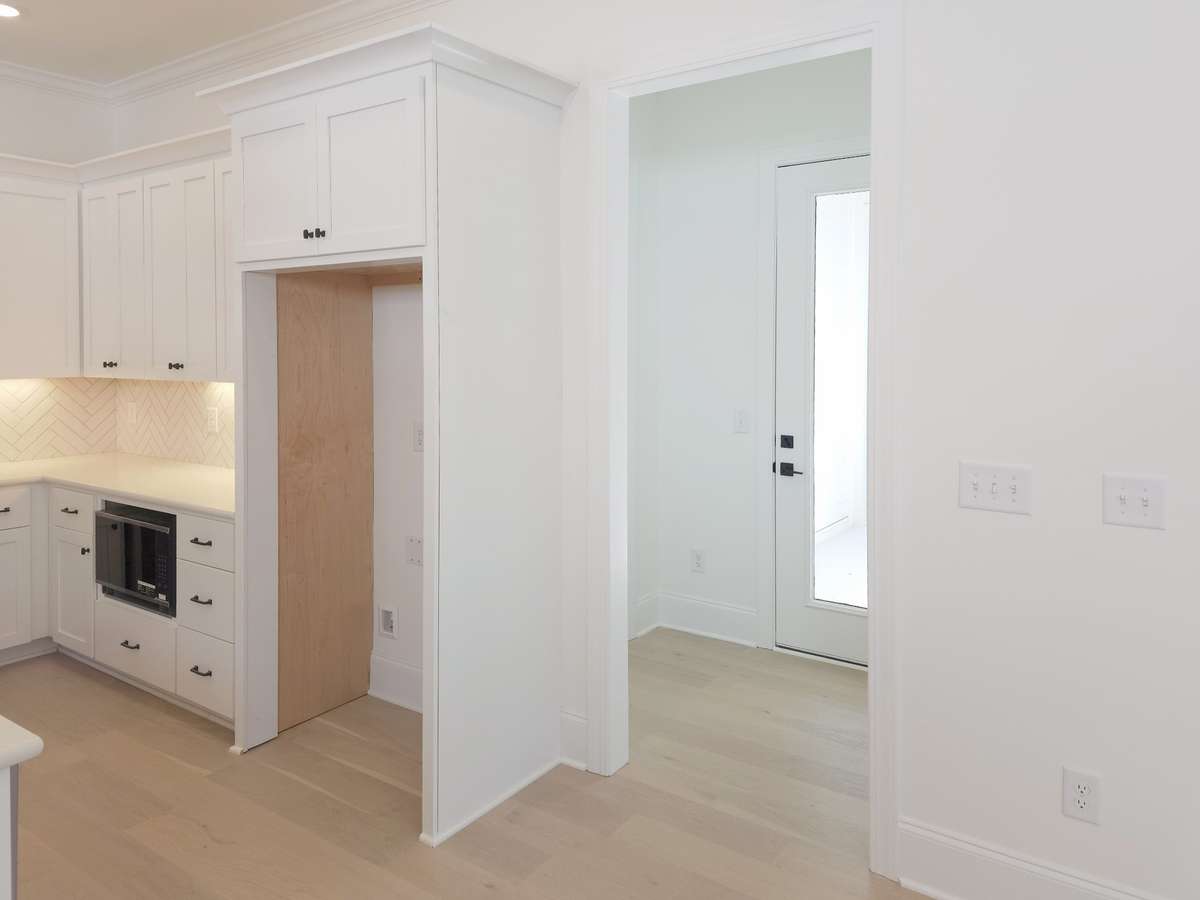 Privately located in it's own hall, you will find the entrance to the covered patio and luxurious owner's retreat!