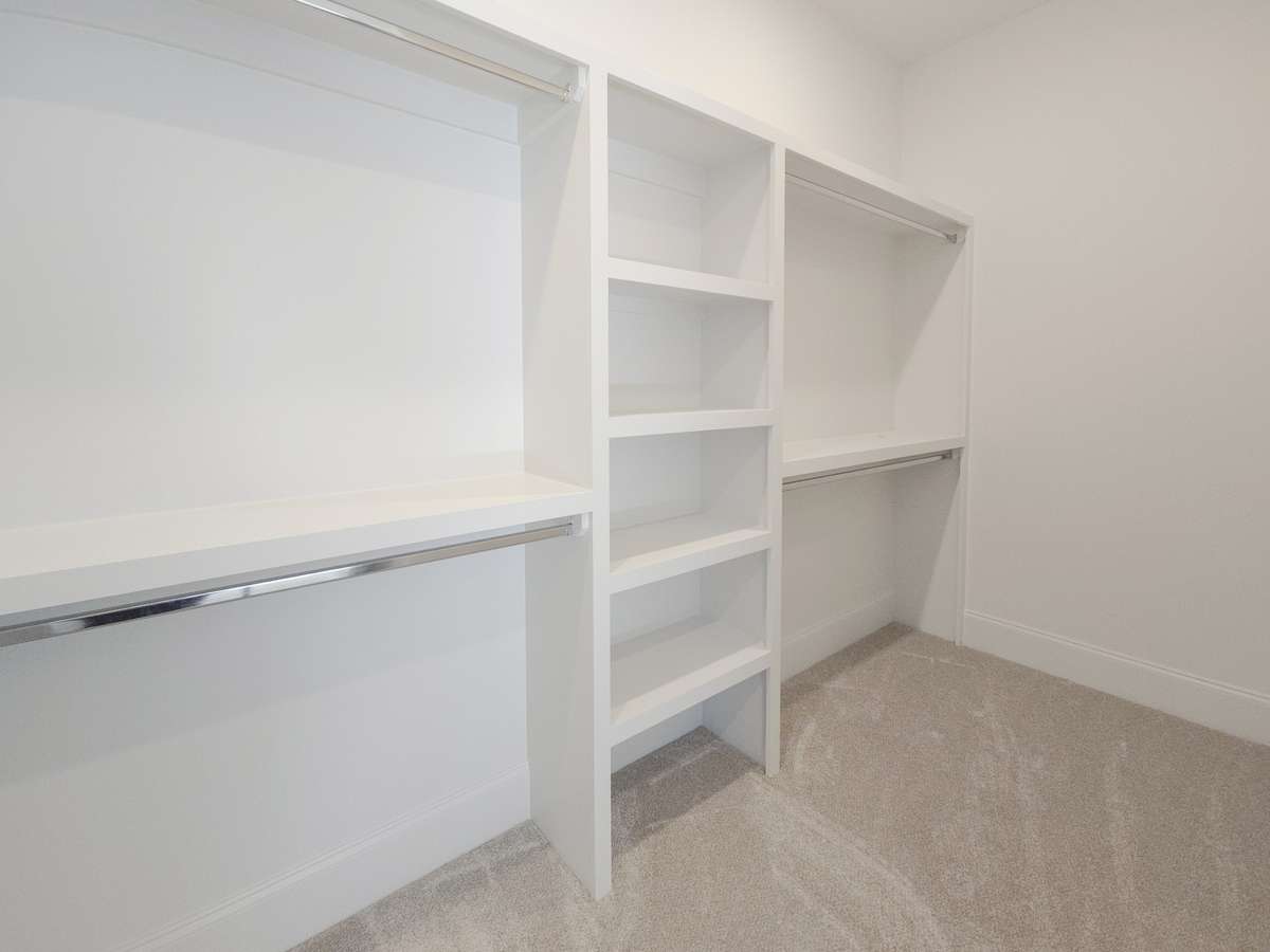 Built-in closets throughout are an added upgrade for organizational convenience