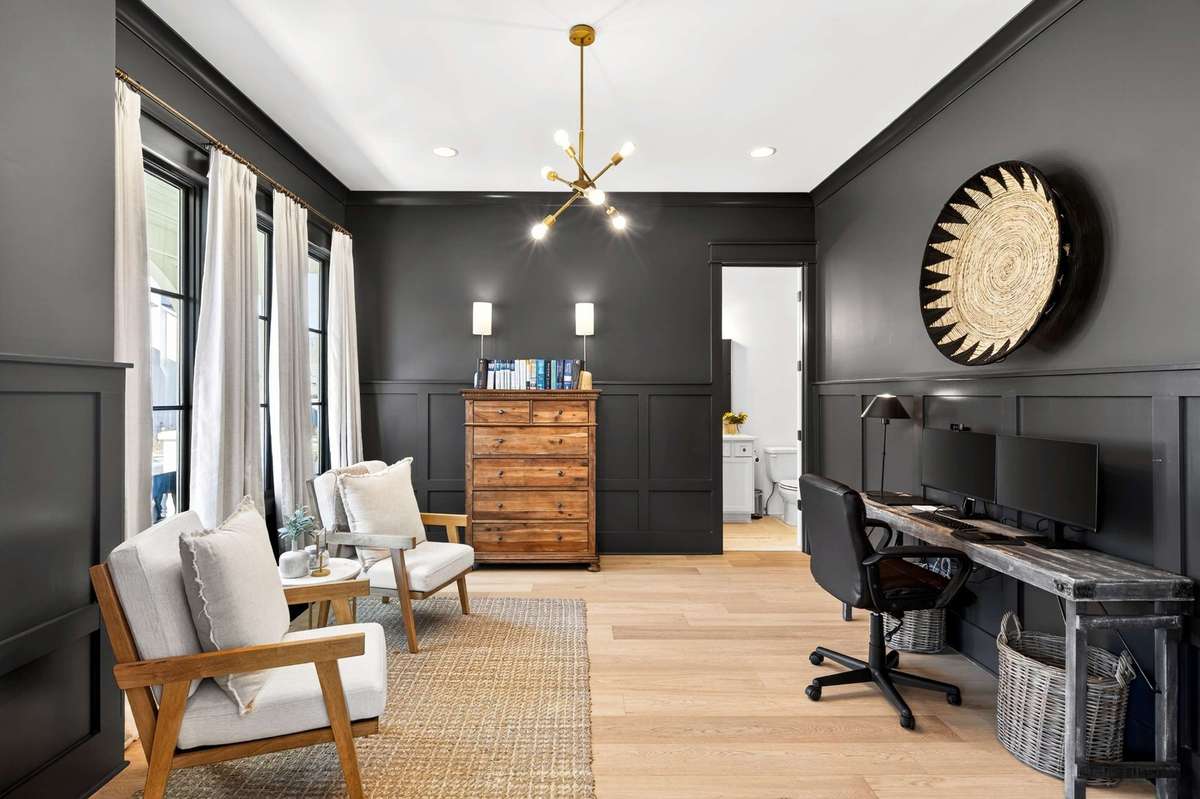 This secondary bedroom with Full bath is currently being used as a home office