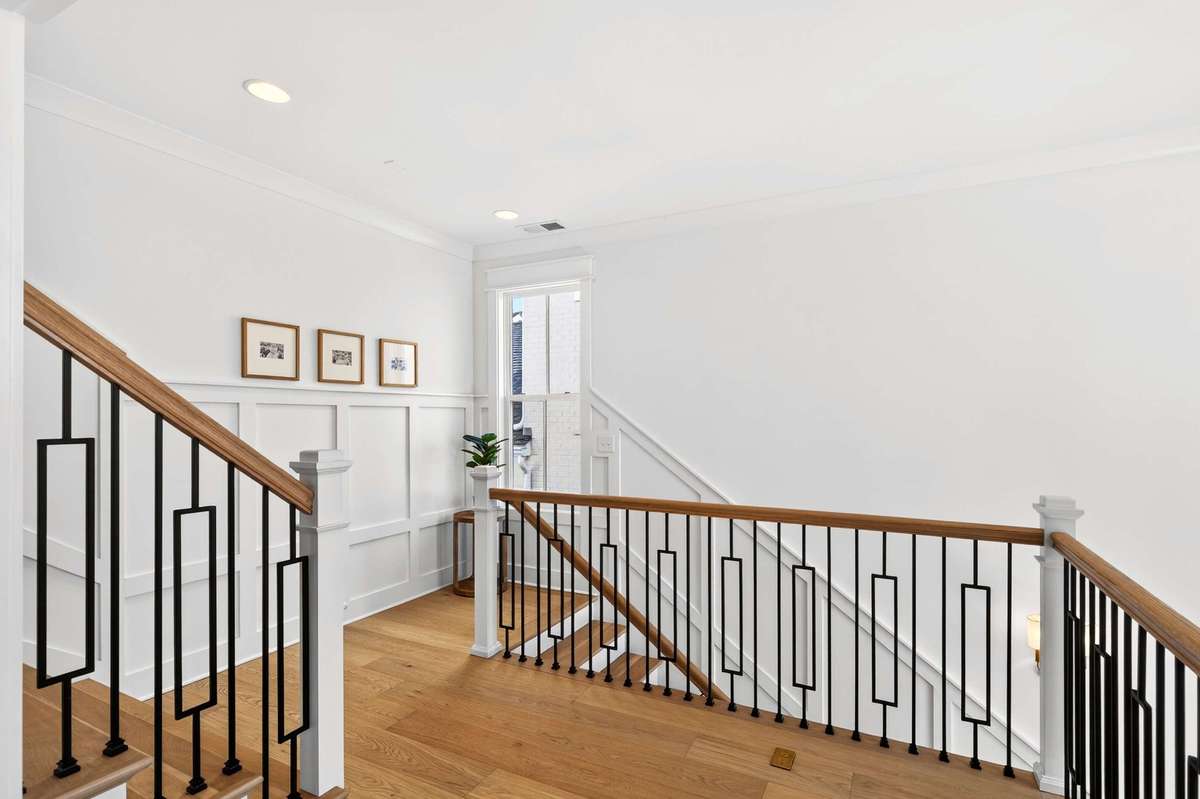 Sellers upgraded the upstairs beds/landing and bonus room to hardwood floors