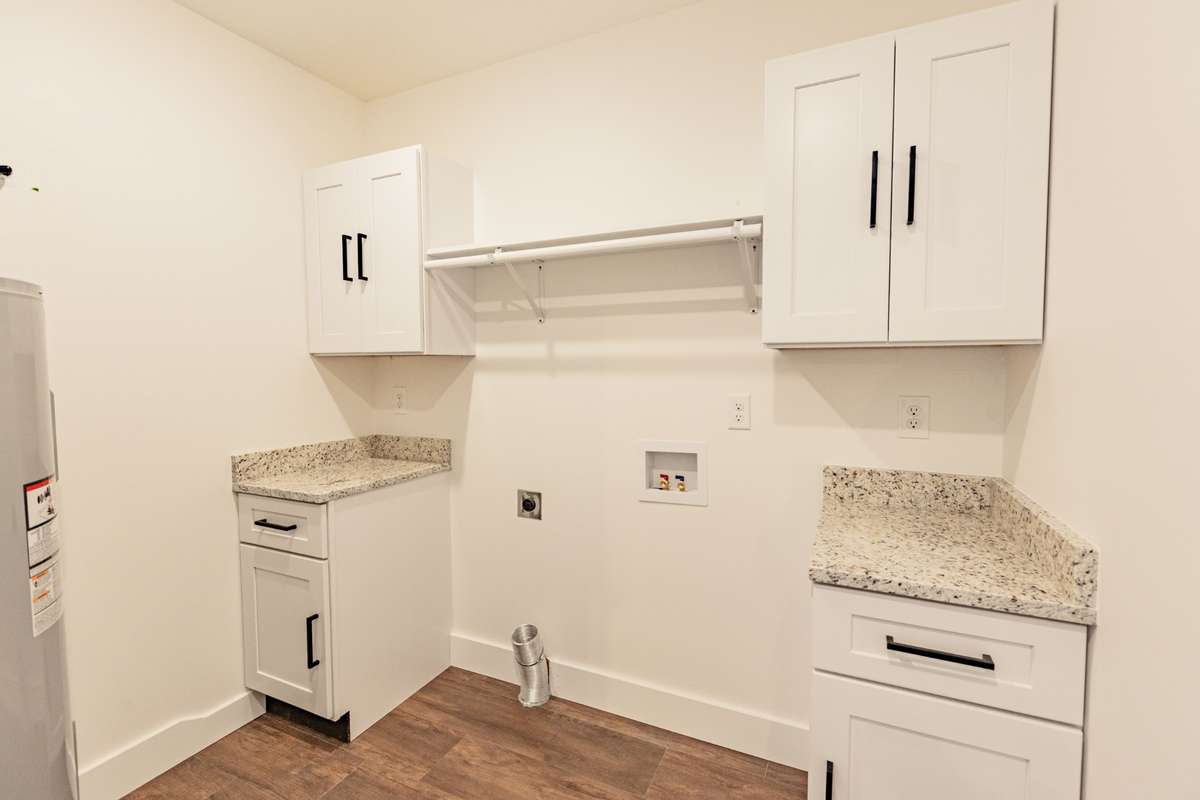 Utility room with built in storage.