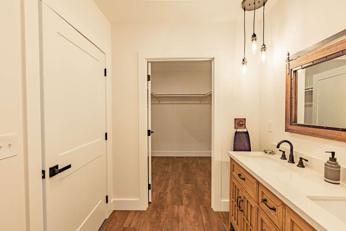 Large walk-in closet in primary bathroom.