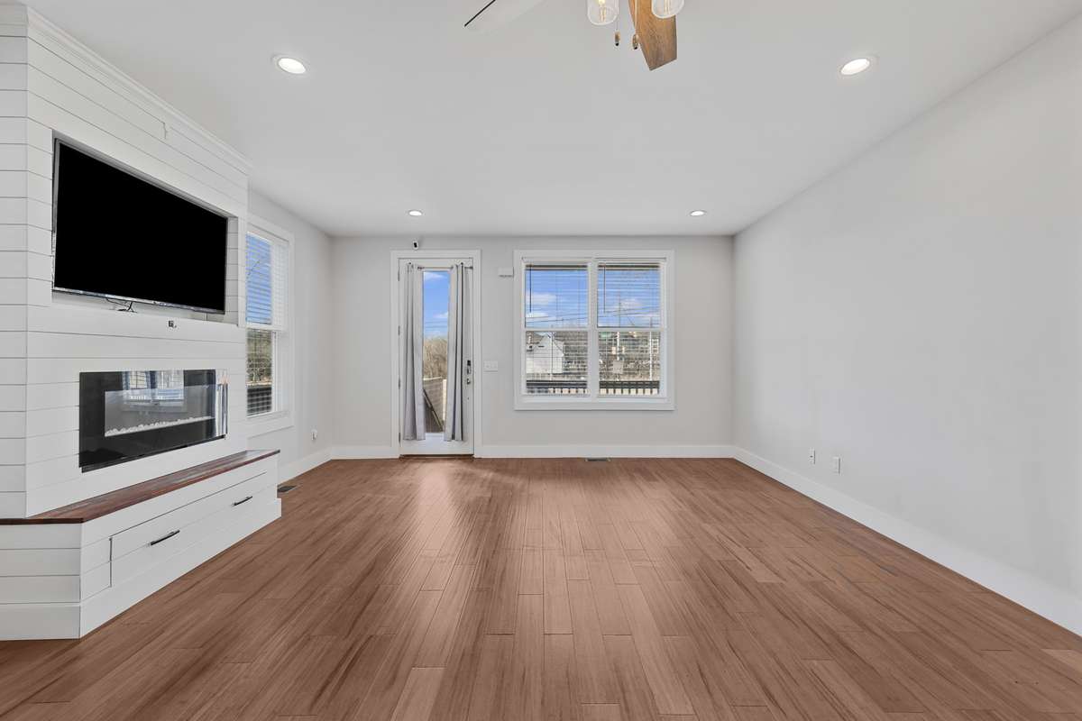 Living Room and Access to Covered Front Porch