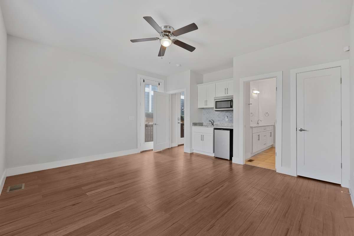 Main Floor Suite has a kitchenette, ensuite bathroom, walk-in closet and access to the exterior. There's two closets.