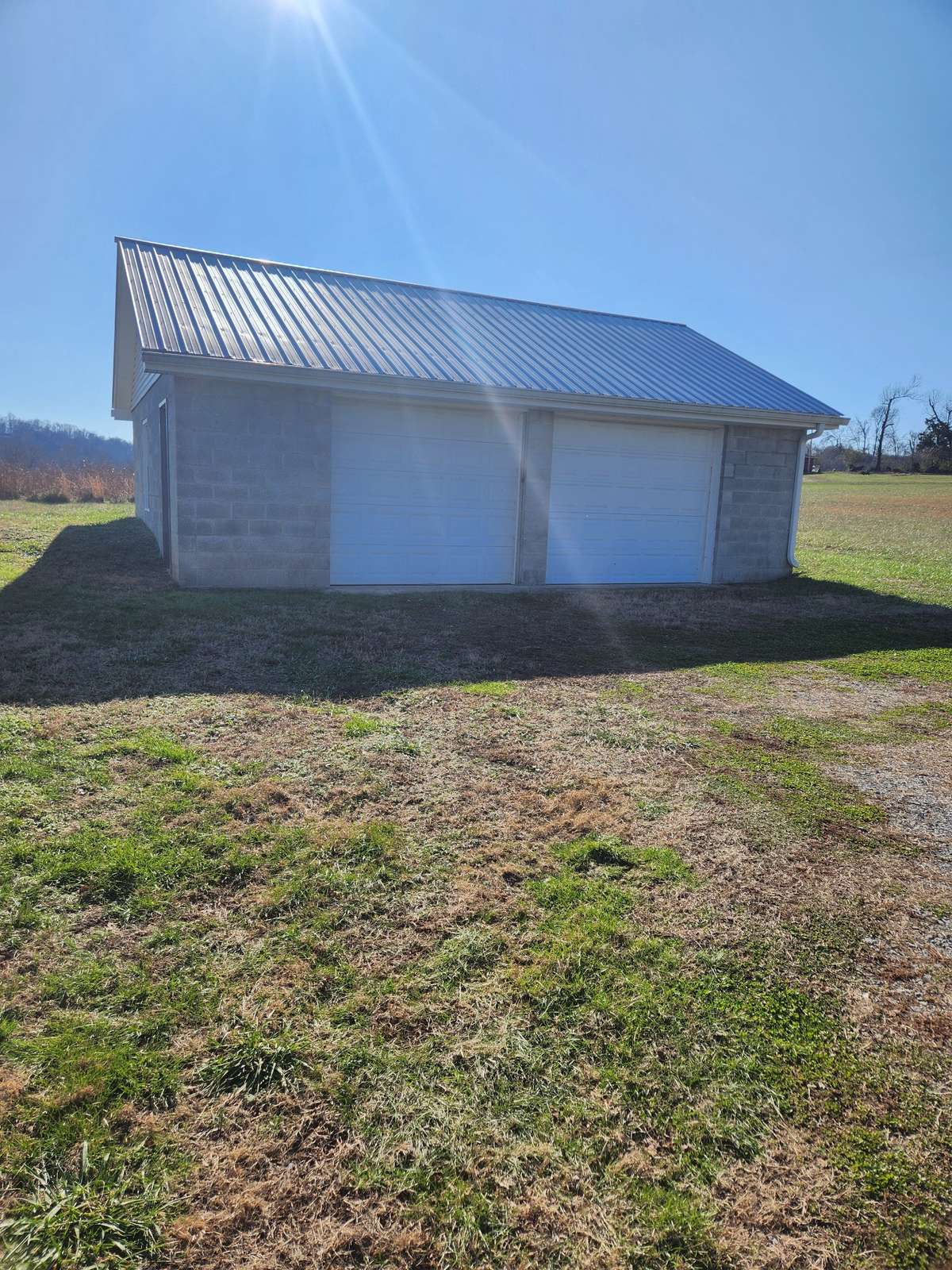 detached garage is leased with house #1353. Has 220 wiring and motor crane