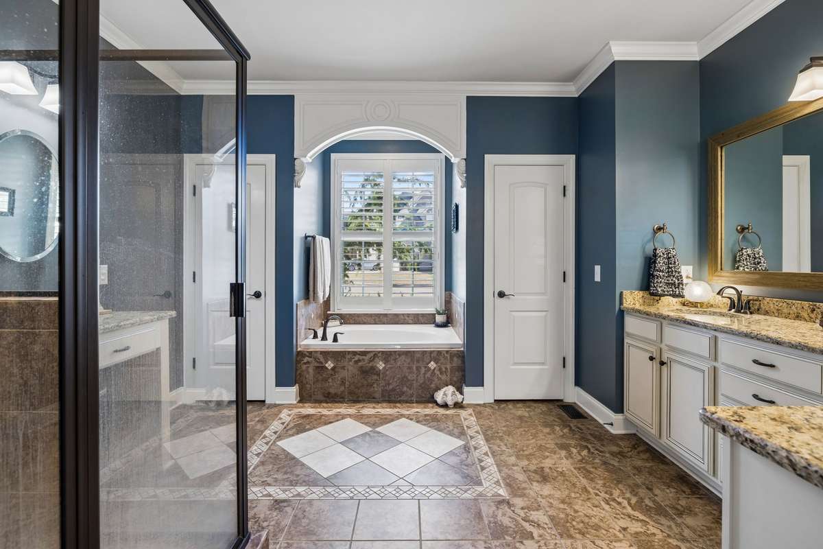 Primary bath includes custom tile detail