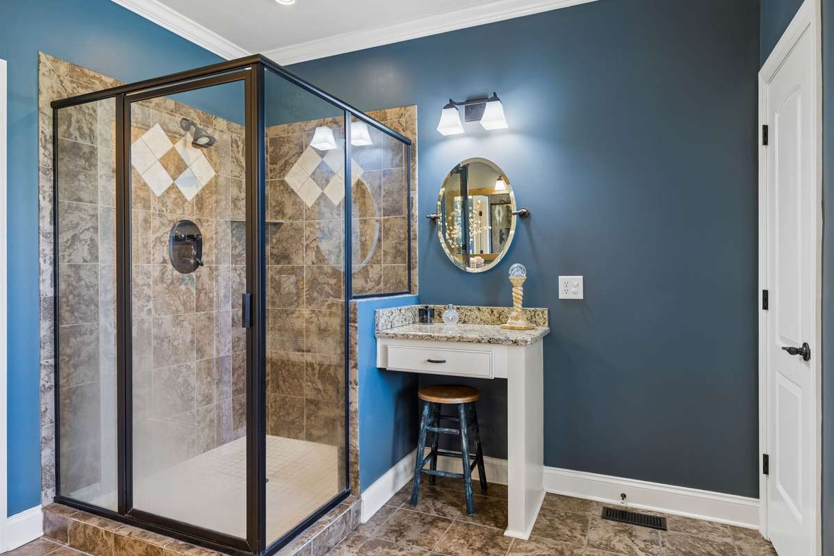 Sitting area and large tile shower