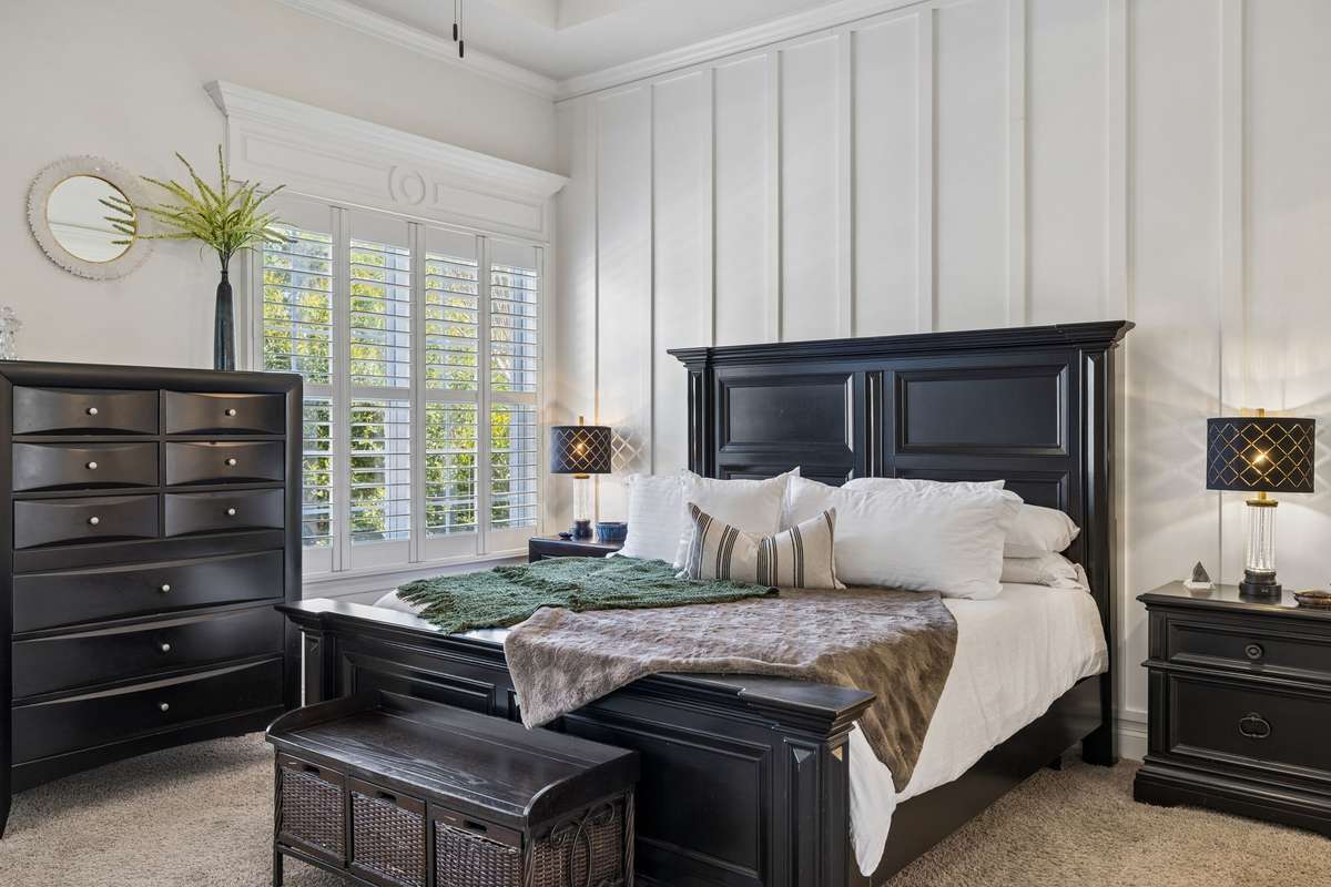 Windows with plantation shutters and trim details