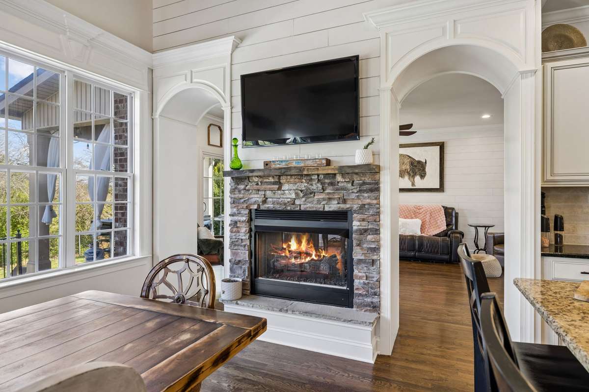 Nothing like the warmth of a fireplace in the kitchen/den during the winter months