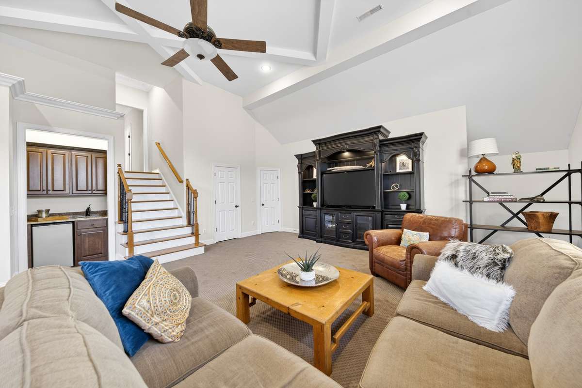 Bonus room has a 12 foot ceiling, wet bar, half bath, and two closets