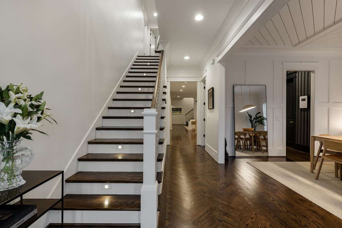 Foyer with herringbone hardwoods