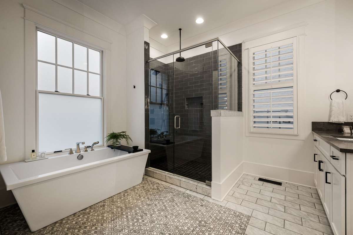 Primary bath with soaking tub and large walk-in shower
