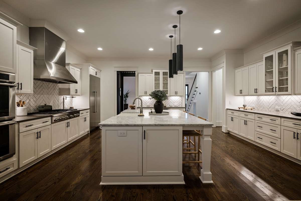 The kitchen has generous prep and storage space