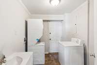 Main floor half-bath with laundry