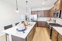 **These photos are examples of a different home with the same floorplan. Interior and exterior may differ.**