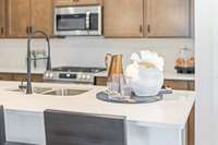**These photos are examples of a different home with the same floorplan. Interior and exterior may differ.**