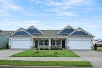 **These photos are examples of a different home with the same floorplan. Interior and exterior may differ.**