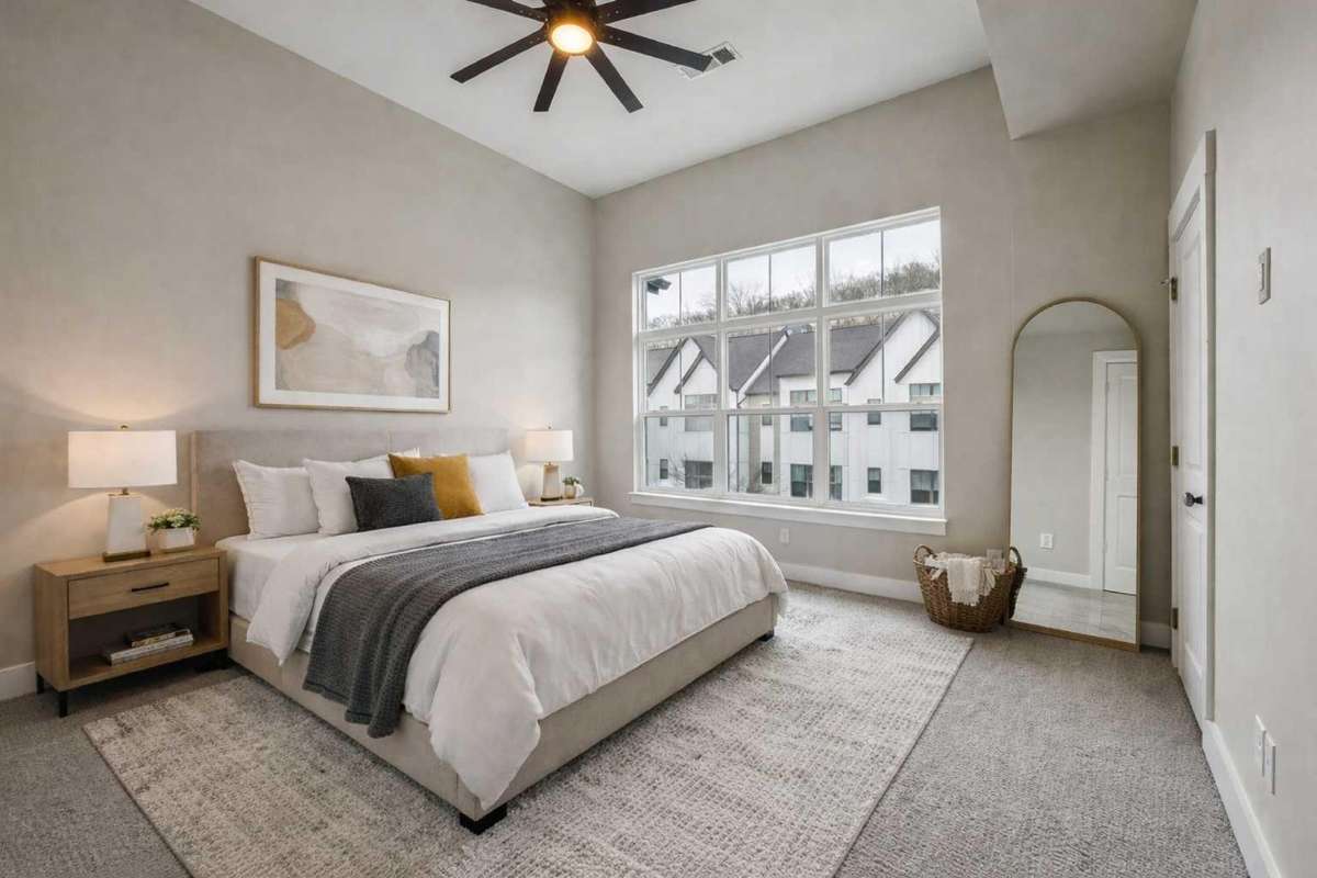 Primary Bedroom with High Ceiling, Ceiling Fan & Large Closet 

Photo is virtually staged for marketing purposes