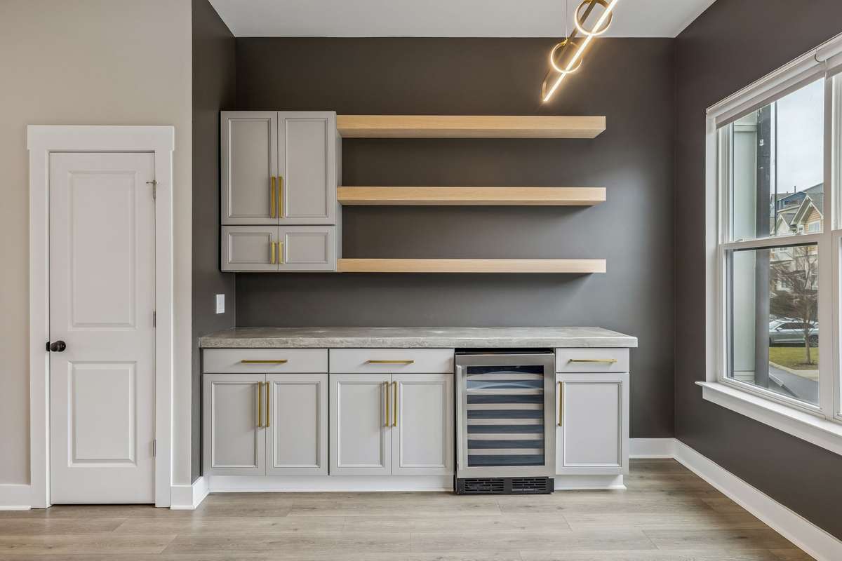 Stunning Wet Bar with Wine Fridge, Concrete Countertops, Custom Cabinetry & Open Shelving