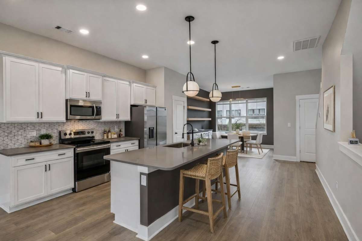 Chef's Kitchen with Quartz Countertops, Tile Backsplash, SS Appliances & Pantry 

Photo is virtually staged for marketing purposes