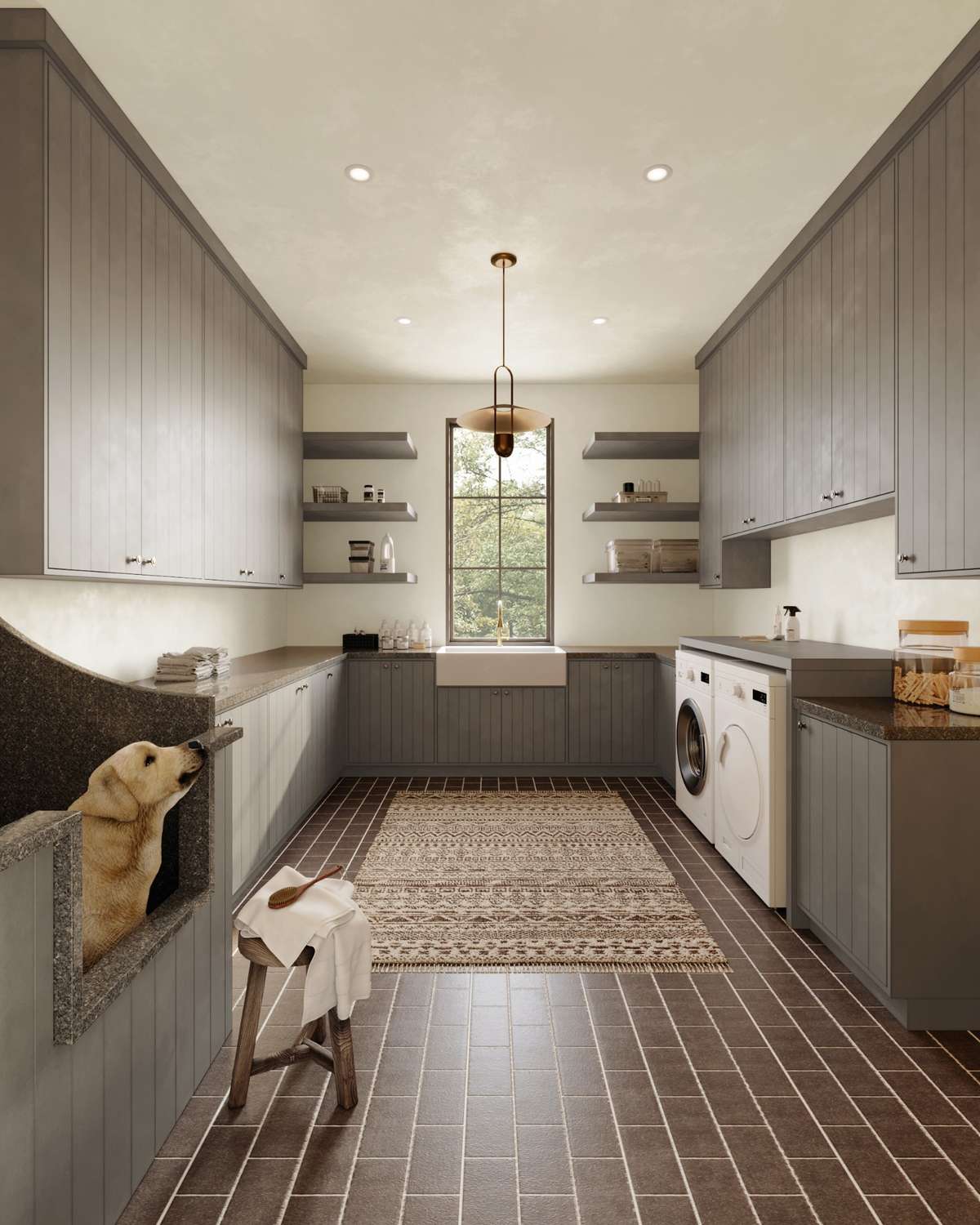 The laundry room combines function and style with brick-pattern tile floors, custom cabinetry, and a built-in dog wash for the furry friends.