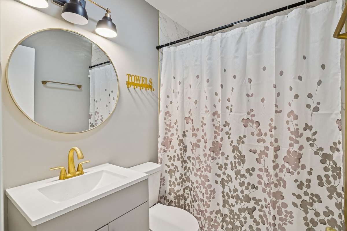 Bright and clean bath with updated vanity, toilet, and fixtures! 550 Harding Place, #F 107, Nashville, TN 37211