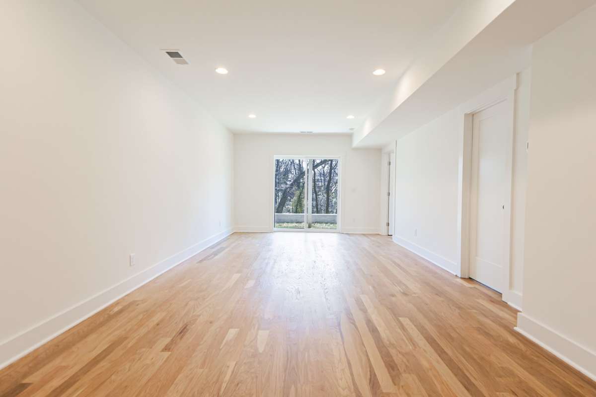 Downstairs finished basement perfect for musicians/mancave or kids with step out covered patio.