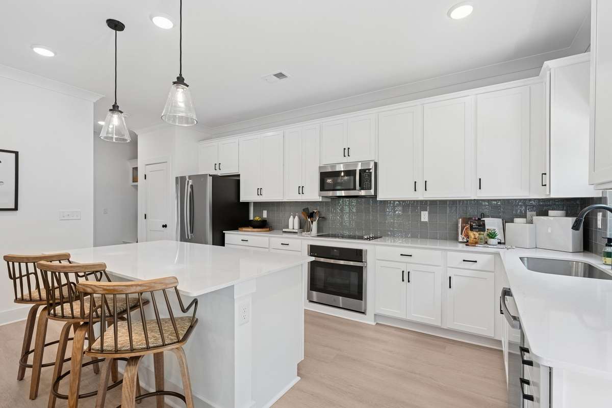 Home is under construction and all pictures are of a completed Whitley plan in a different community so finishes will vary.