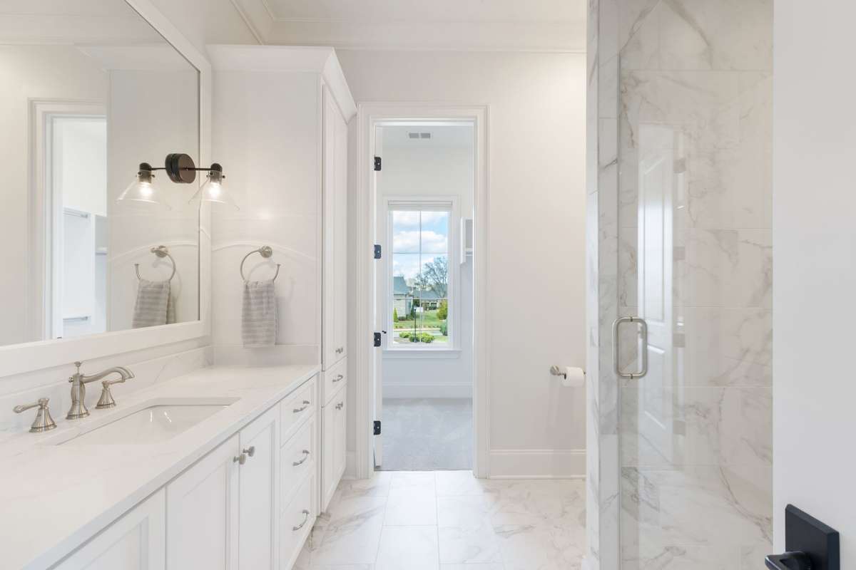 3 secondary bedrooms on the second floor all with attached en suites featuring a walk in shower, separate soaking tub and walk in closets