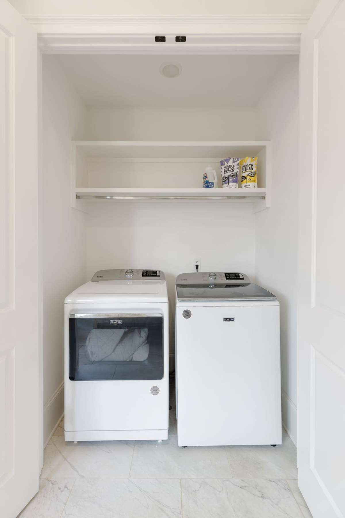 a private full size laundry closet is located inside the primary bathroom (separate from the additional main floor laundry room)