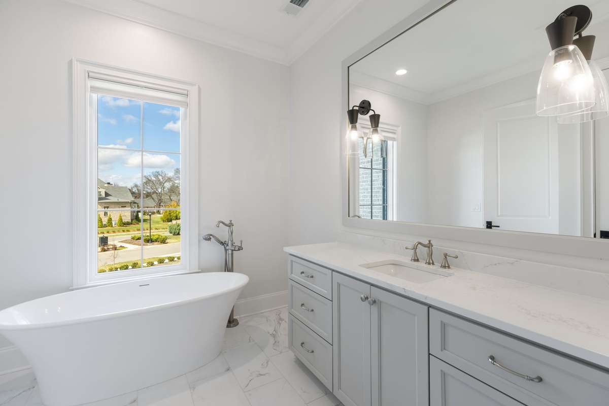 3 secondary bedrooms on the second floor all with attached en suites featuring a walk in shower, separate soaking tub and walk in closets