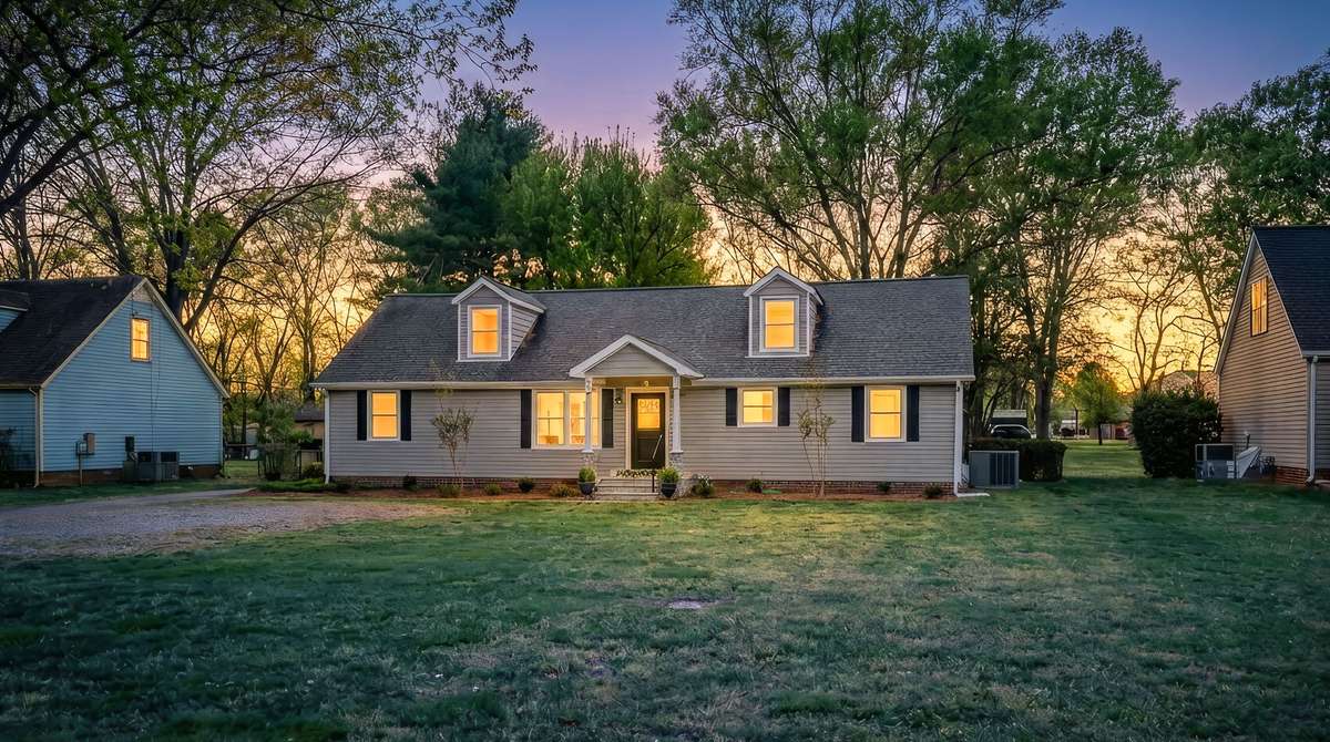 HOME FEATURES NEW PAINT, FLOORING, NEW KITCHEN, UPDATED BATHS, FRONT DOOR, PUCK LIGHTING THROUGHOUT, CEILING FANS, MAILBOX, COVERED & SCREENED BACK DECK WITH DOGGY DOOR + DOG RAMP, 20X22 WORKSHOP & 12X10 STORAGE SHED W/LEAN-TO BEHIND.