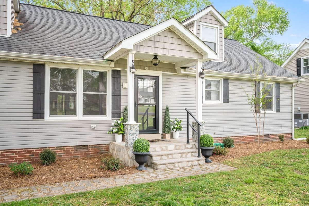 ALL NEW LANDSCAPING IN THE FRONT...WE CANNOT WAIT TO SEE THE CRAPE MYRTLES & ROSES BLOOM! THE MOSSY STONE PATHWAY ADDS TO THE CHARM OF THIS HOME. NEW FRONT DOOR AND EXTERIOR PORCH LIGHTS ARE WELCOMING.