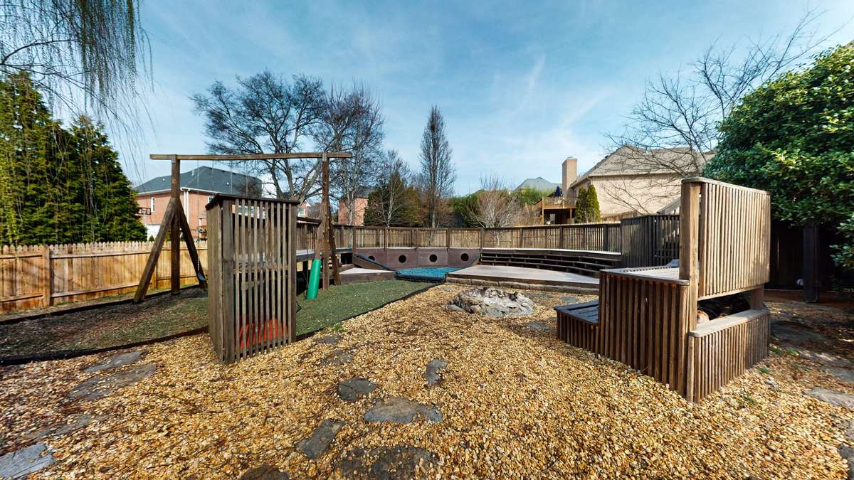 Swing set and climbing wall