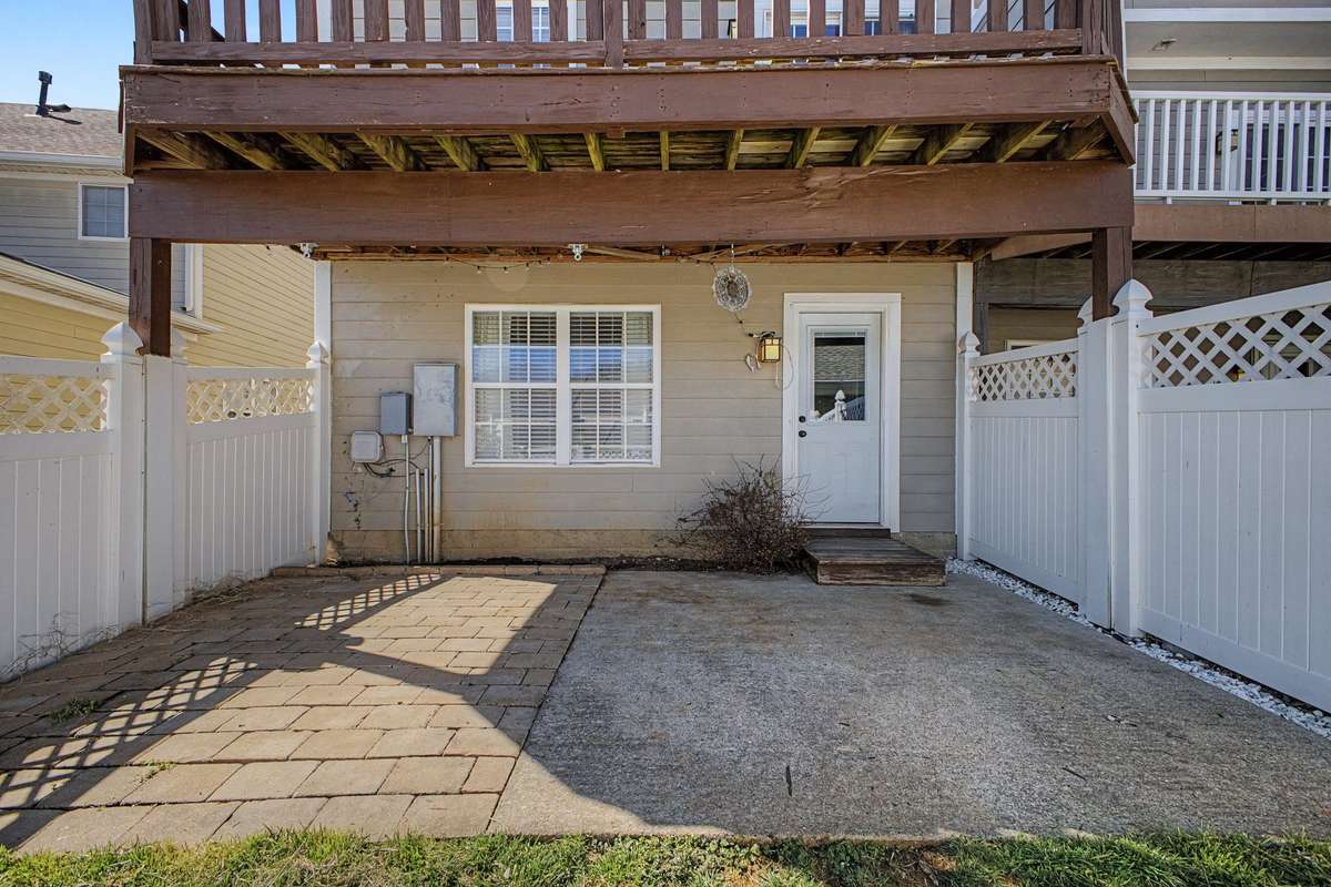 Backyard space for more patio enjoyment and a grassy area for pets.