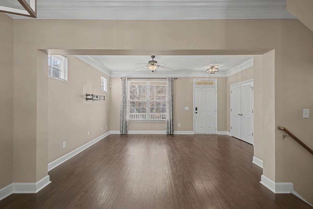 A view to Great Room from the Dining area.  Plenty of natural light surrounds the space.