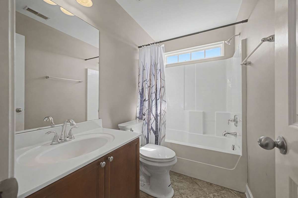Full Bath on level 2 to share for Bedroom 2 and 3.