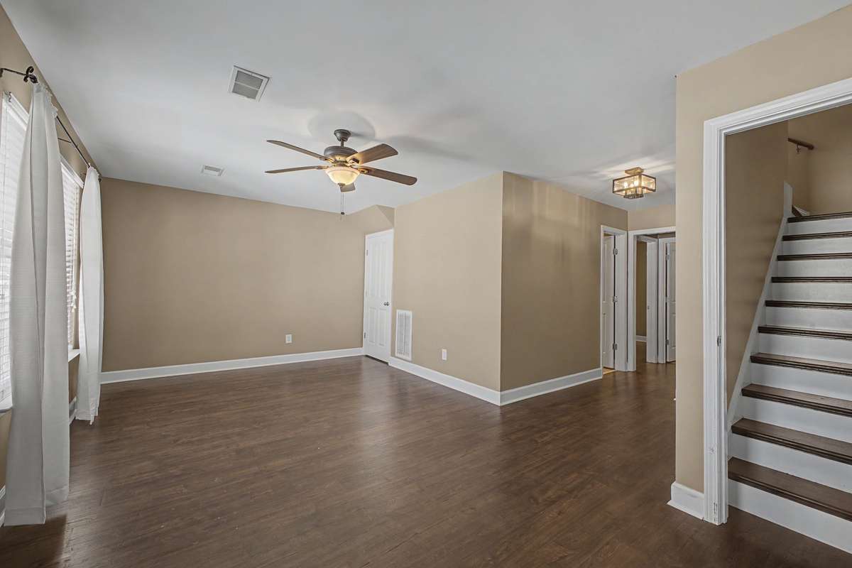 Lower level Living Area.  Lots of space for secondary entertainment or office.  The lower level Full Bath is the door you see in the corner.