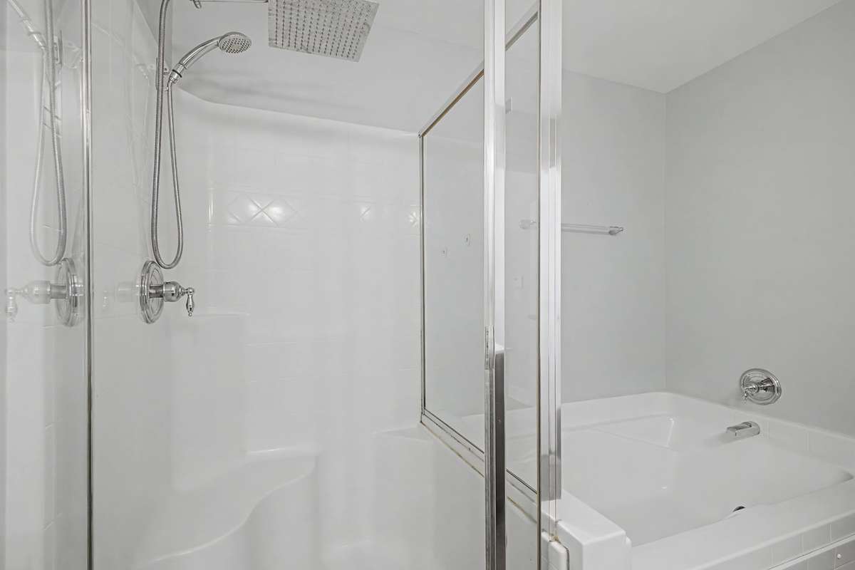 Separate shower and bath in the Primary Bathroom.
