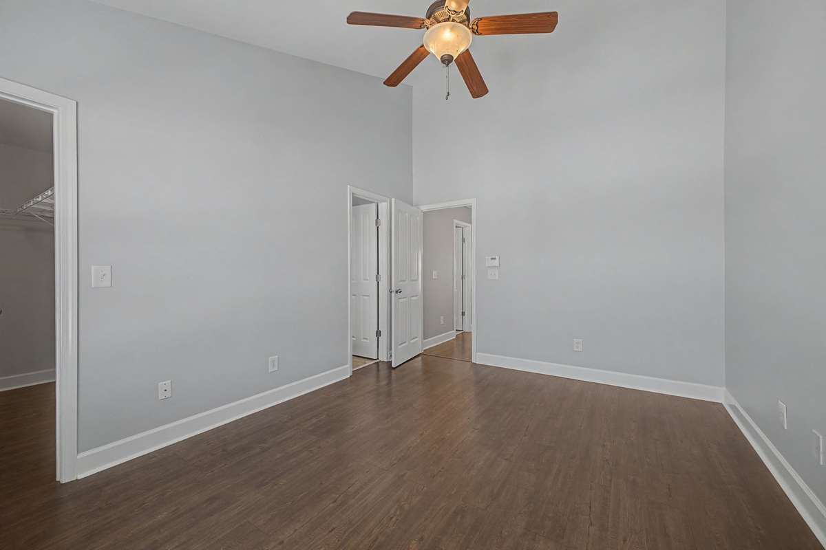 Primary Bedroom with wall space for multiple dressers.