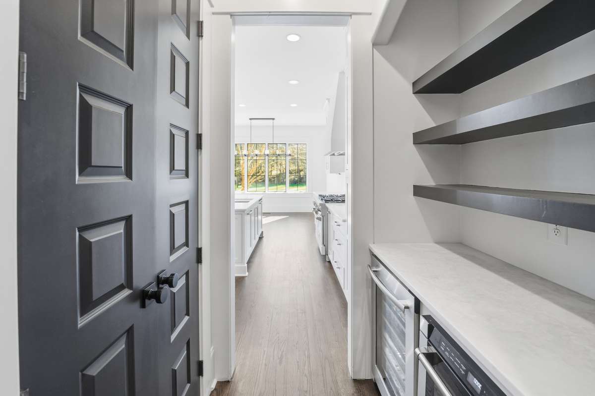 Butlers pantry leading to kitchen
