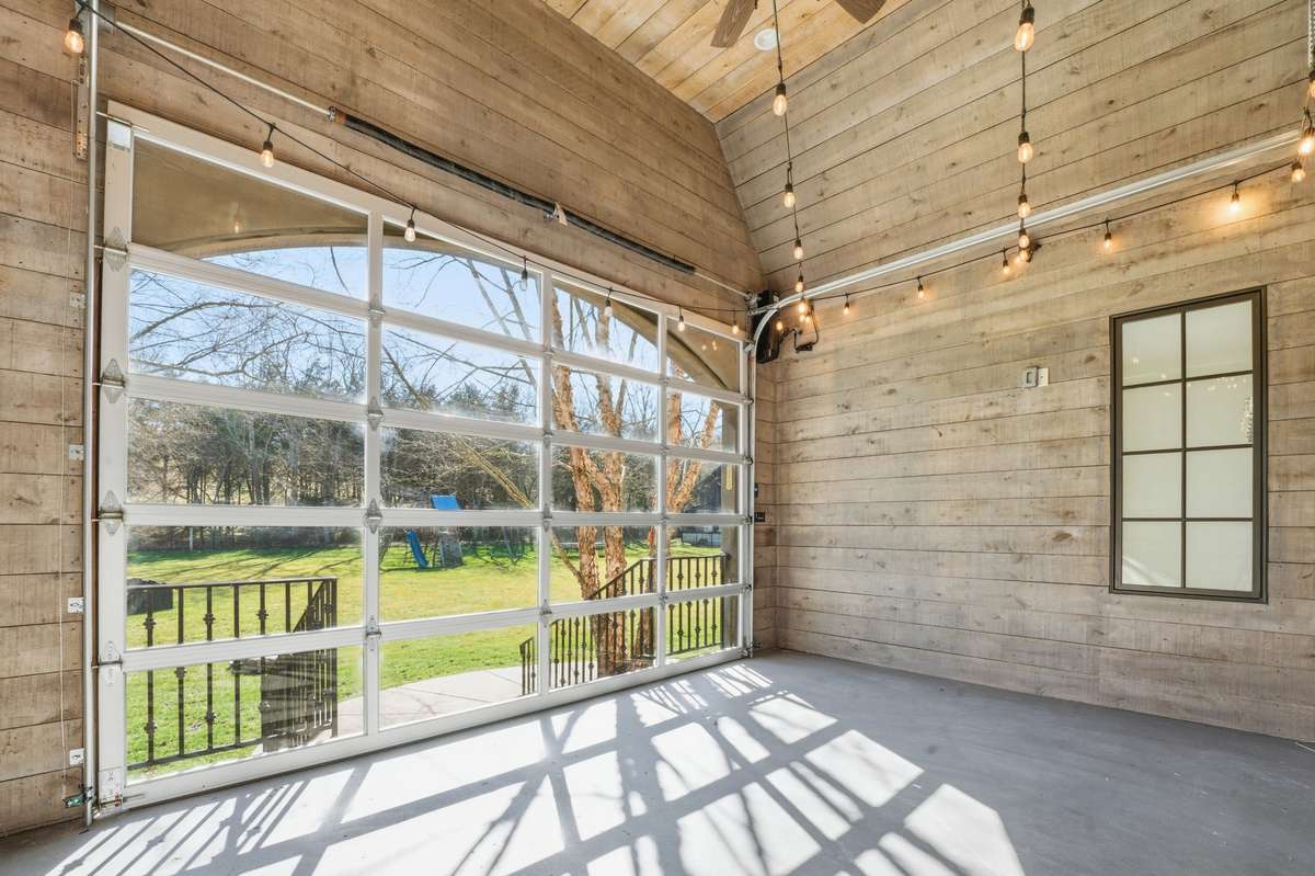 Enclosed porch to rear of home off family room. gas connection for heater or put in mini split to heat and cool if you desire
