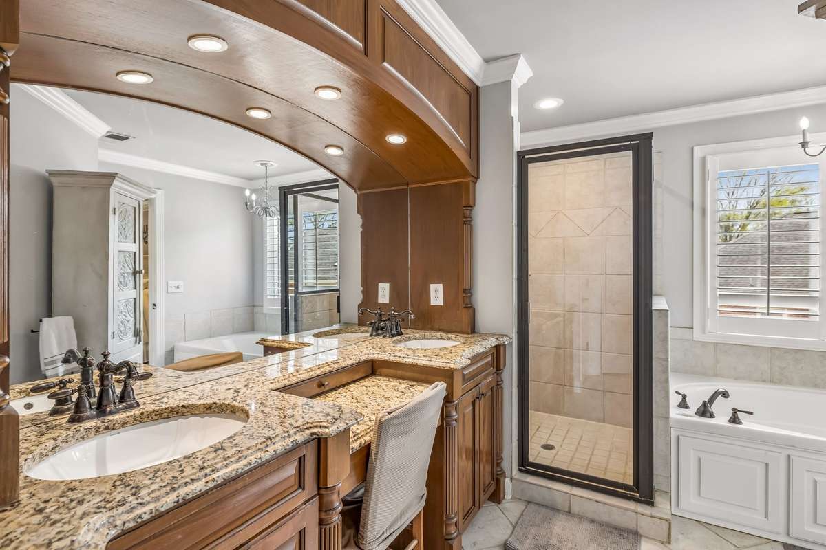 Primary Bath with seperate tub and shower with walk in closet