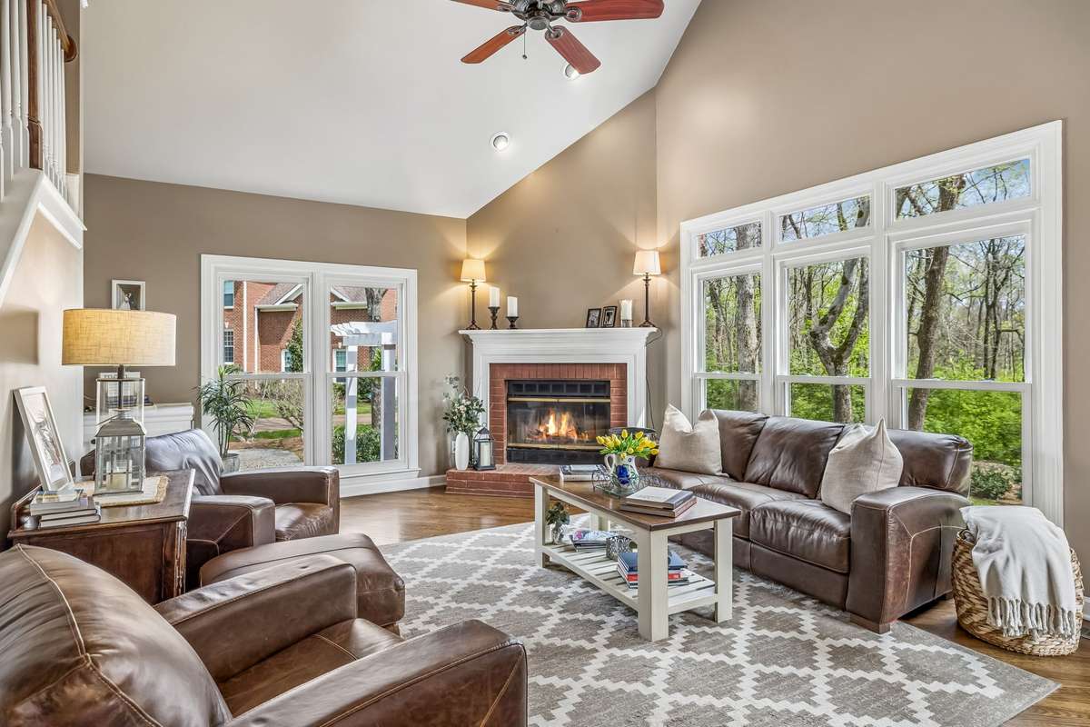 Sit back and relax in your two story living space that overlooks the serene park like backyard