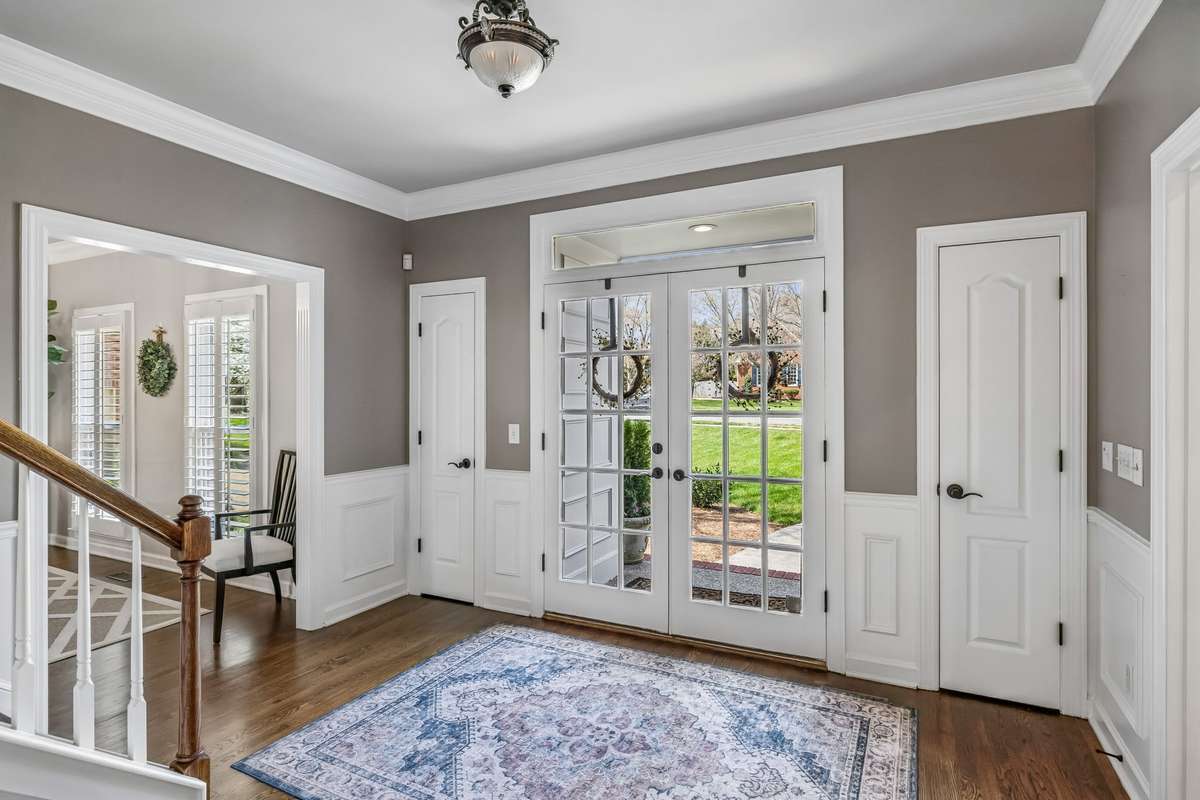 Beautiful inviting double glass doors welcome you into this stunning home and foyer.