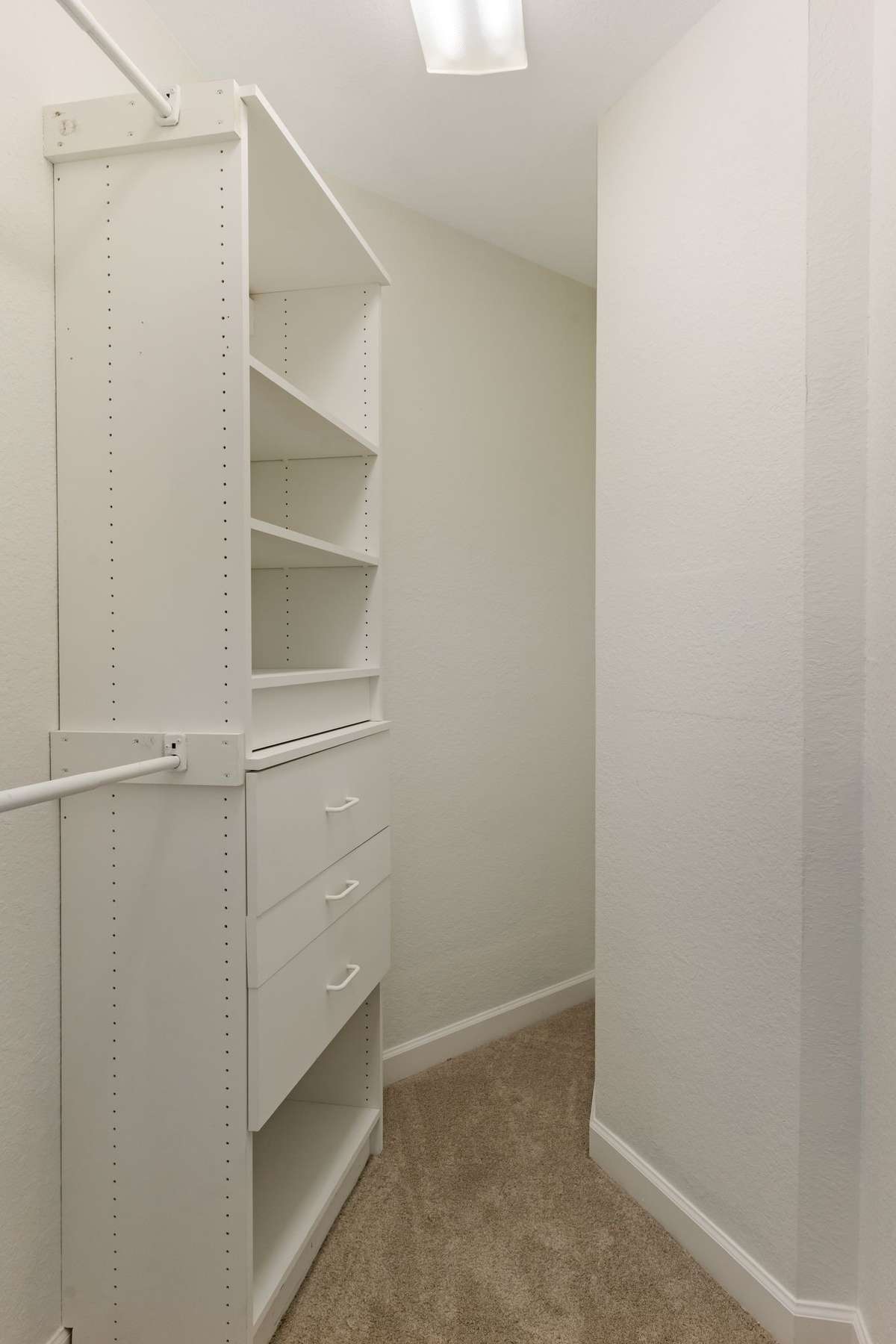 Guest bedroom 2 boast a walk-in closet with built-ins.