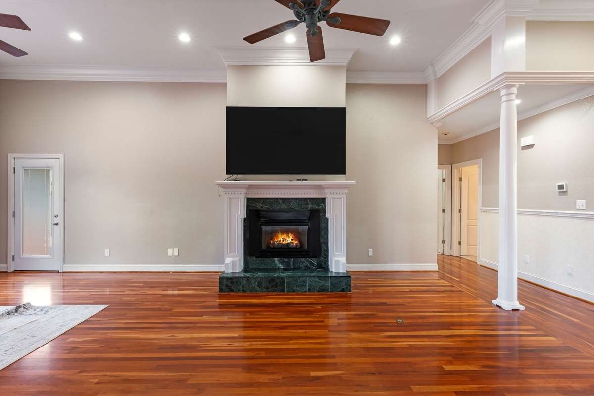 Living Room with gas fireplace and 86" Samsung TV