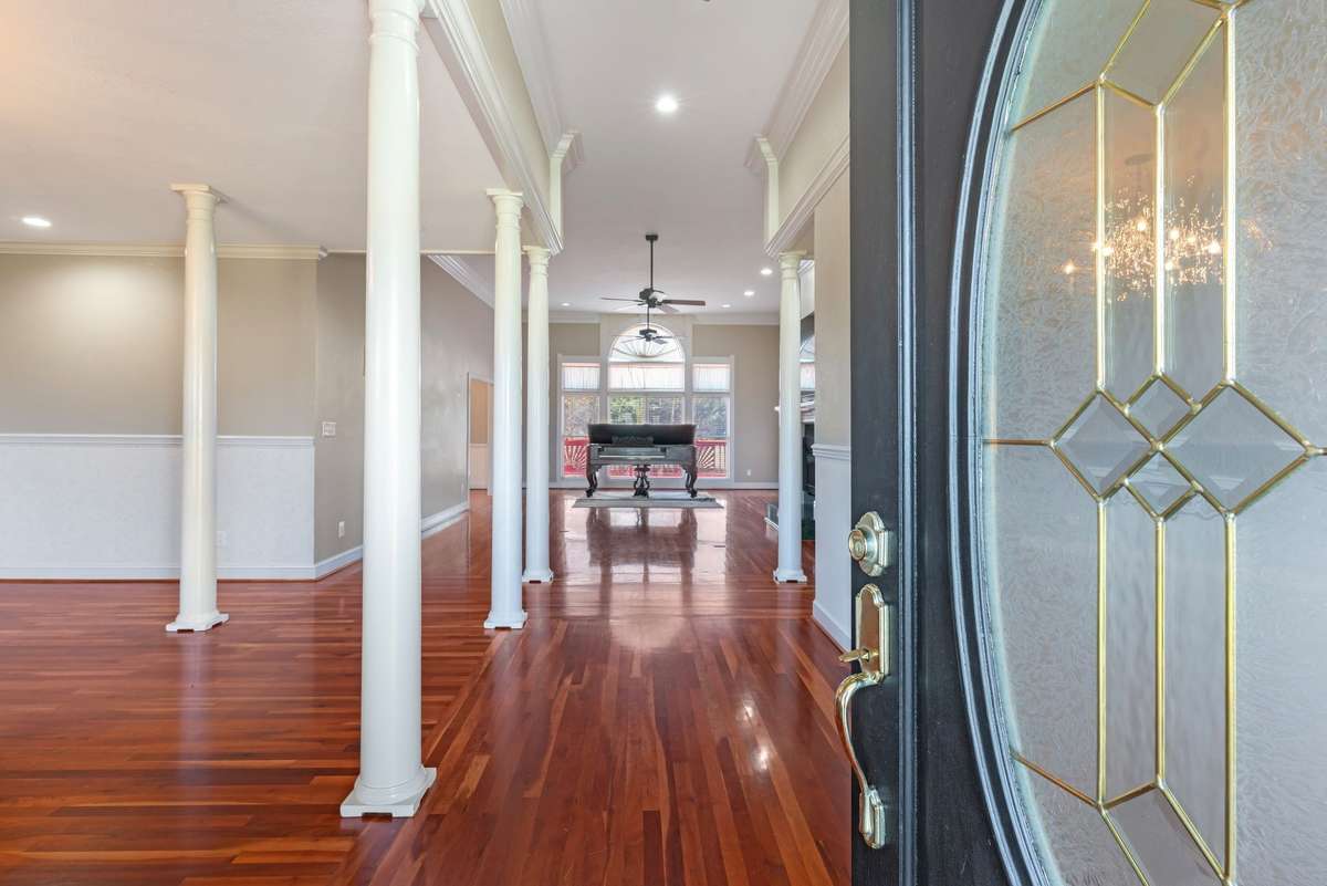 Open floorplan with beautiful Cherry Hardwoods.